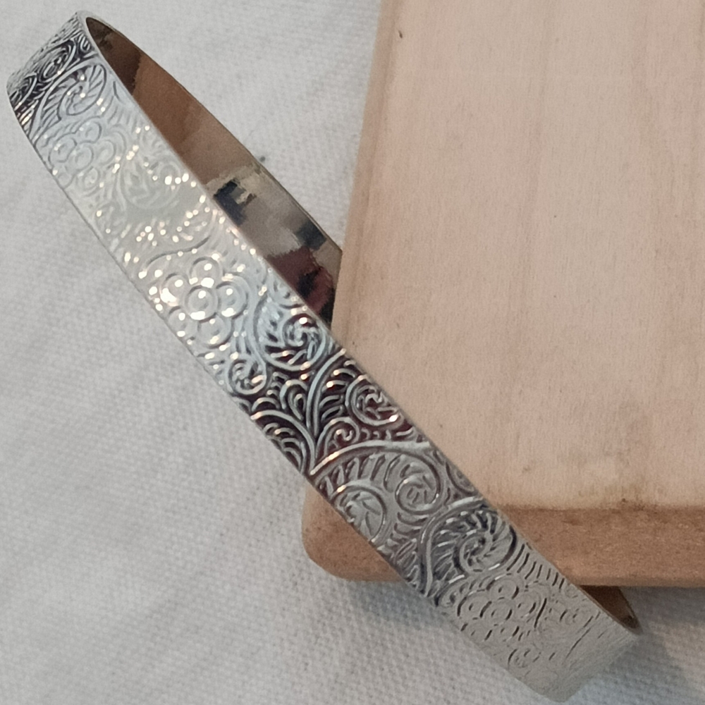 Engraved Silver-Tone Floral Bangle Bracelet